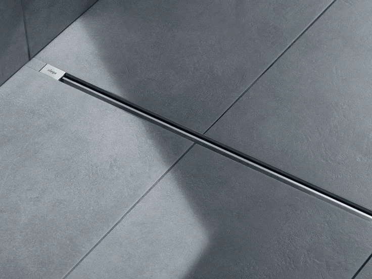 Schéma de pente d'une douche italienne : 1 à 2 cm par mètre vers la bonde d'évacuation Ø 50 mm